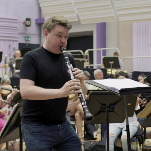 Mark Simpson playing clarinet with the BBC Philharmonic Orchestra.