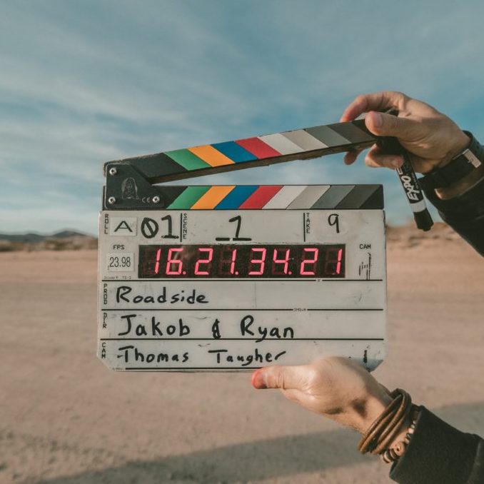 A clapperboard on a film set