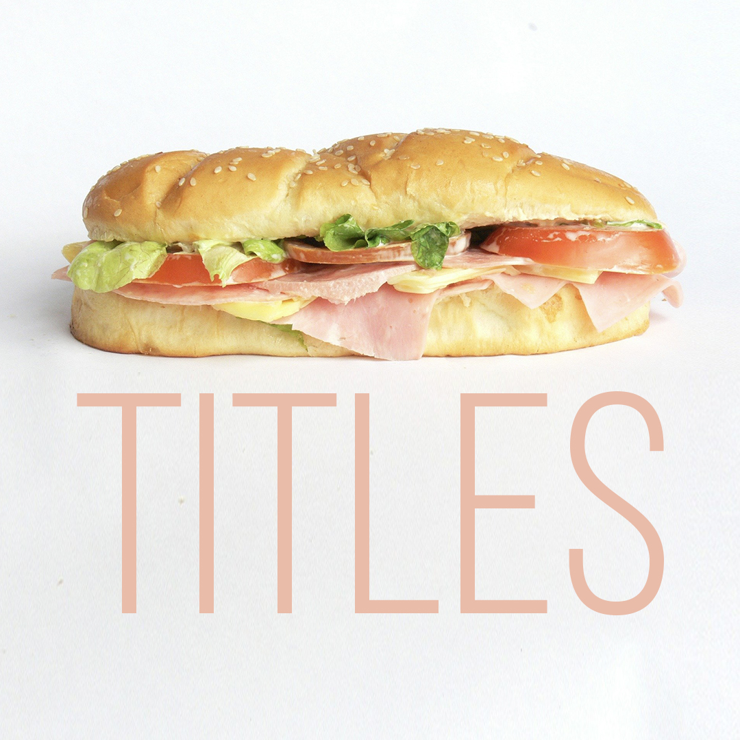 A sub sandwich with the word "titles" underneath