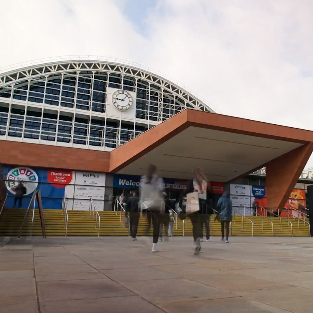 Screengrab of a timelapse video showing people arriving at the front entrance of Manchester Central Convention Complex